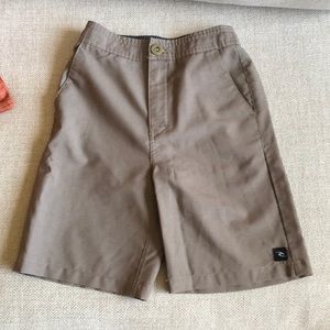Boys Rip Curl shorts.